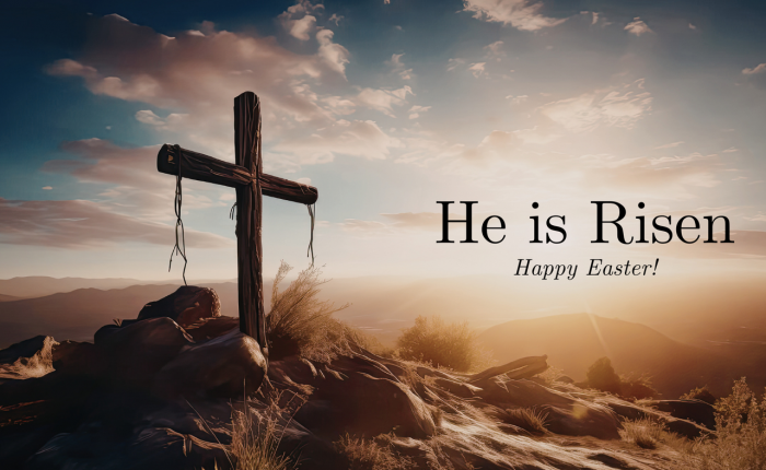 Cross on a rocky hill at sunrise with Easter message: 'He is Risen' and 'Happy Easter!'